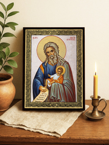 Икона на Св. Симеон Богоприемец със сребърен фон и златна рамка